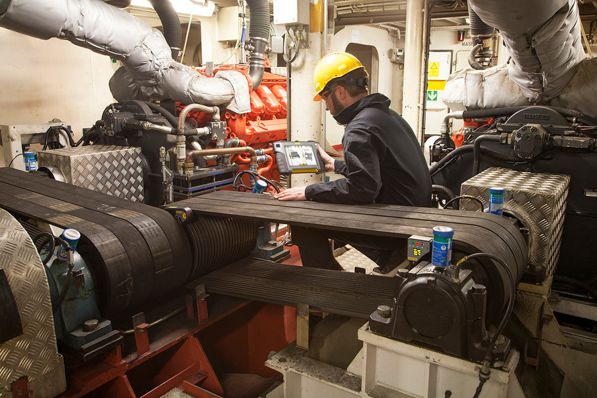 Alignment of a belt assembly on a ferry
