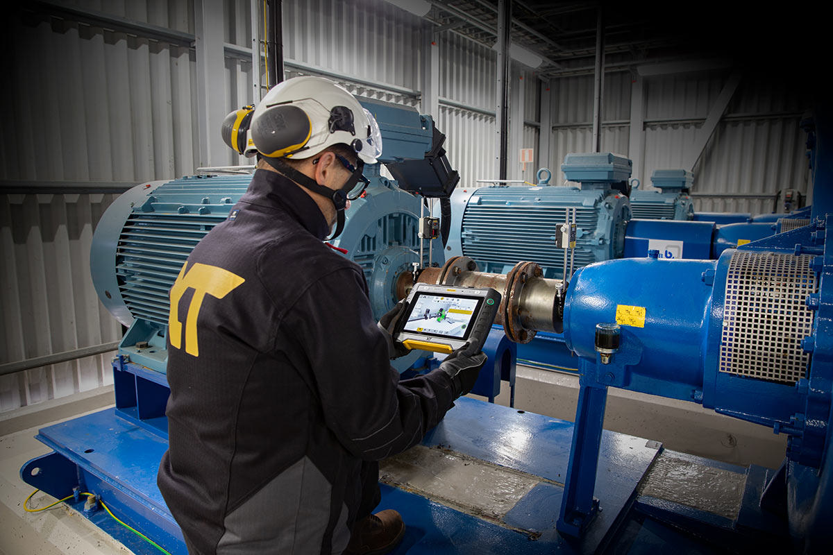 Man standing in front of machine
