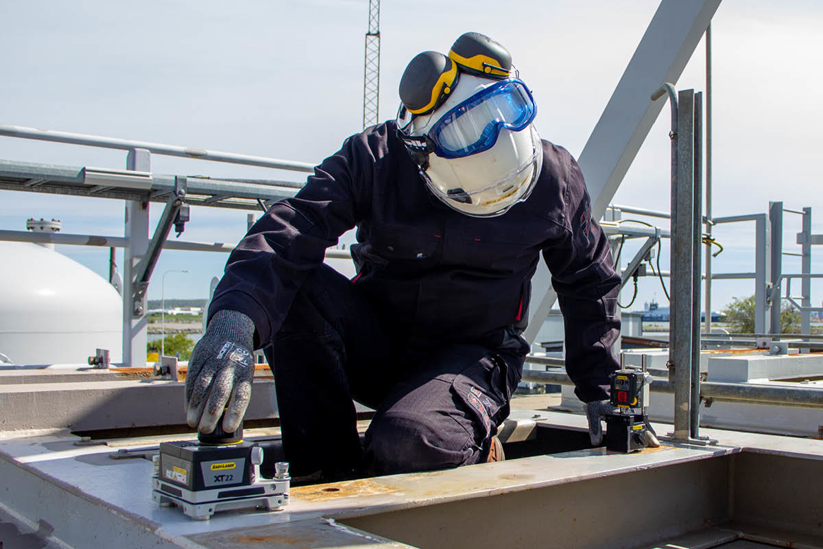 Man using equipment for measuring