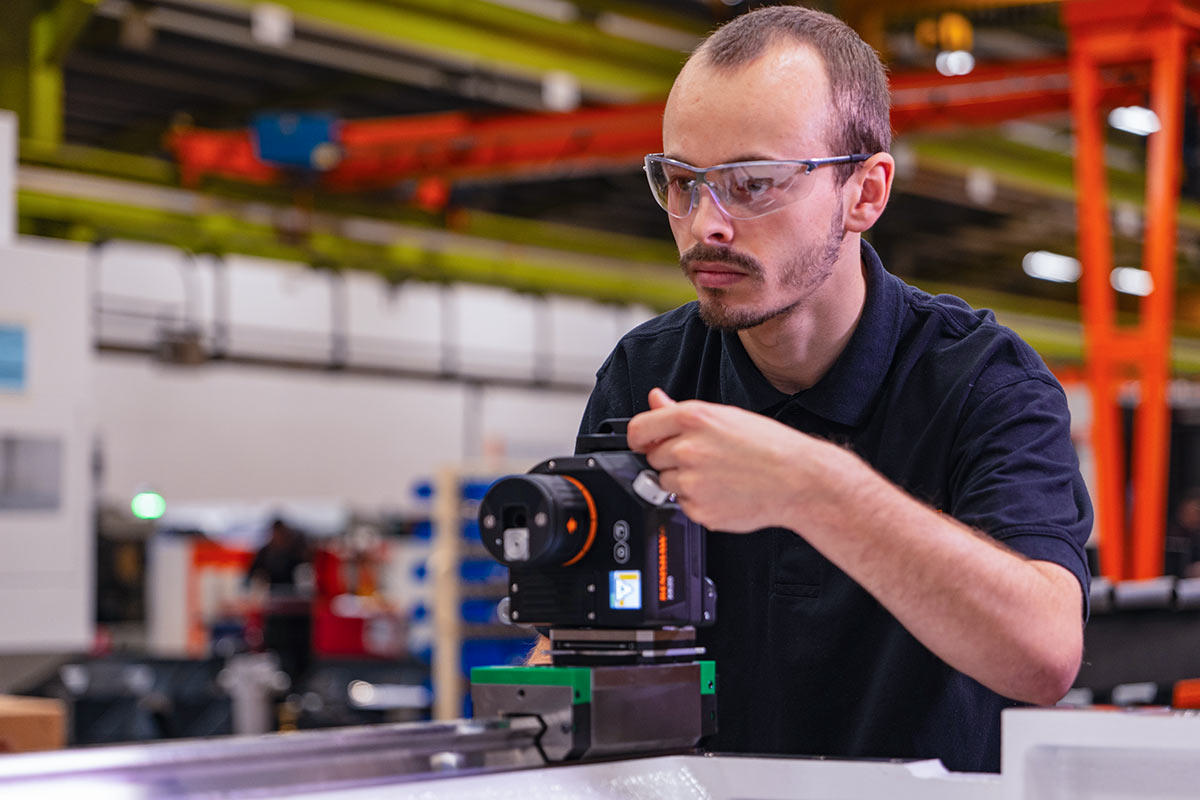 Man using XK20 laser measurement system